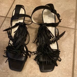 Real leather black Kenneth Cole sandals. Cute fringe detail.